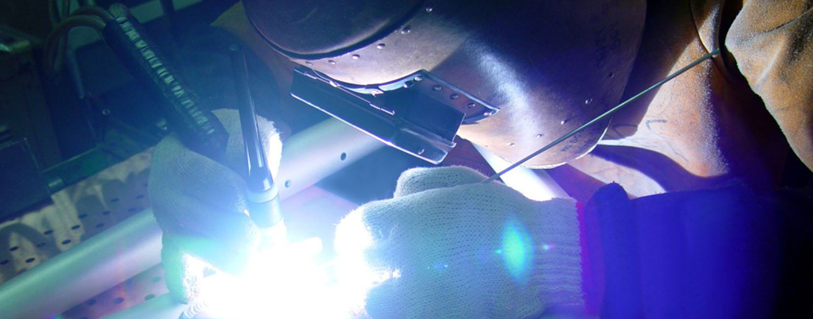 Professional welder performing metal fabrication work