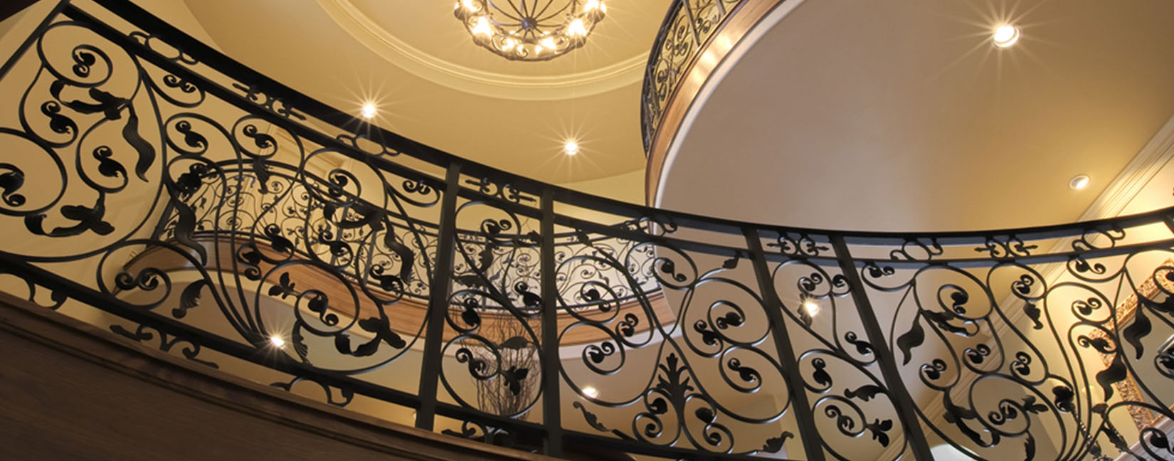 Decorative custom iron railing inside a finished property